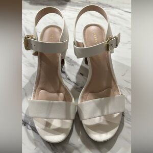 Size 8.5 women’s white with brown faux wooded heel - only worn once
